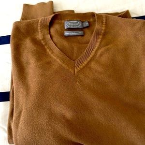 A Talbots Men’s long sleeve sweater.Brown in Color.Size XX with V neck collar..